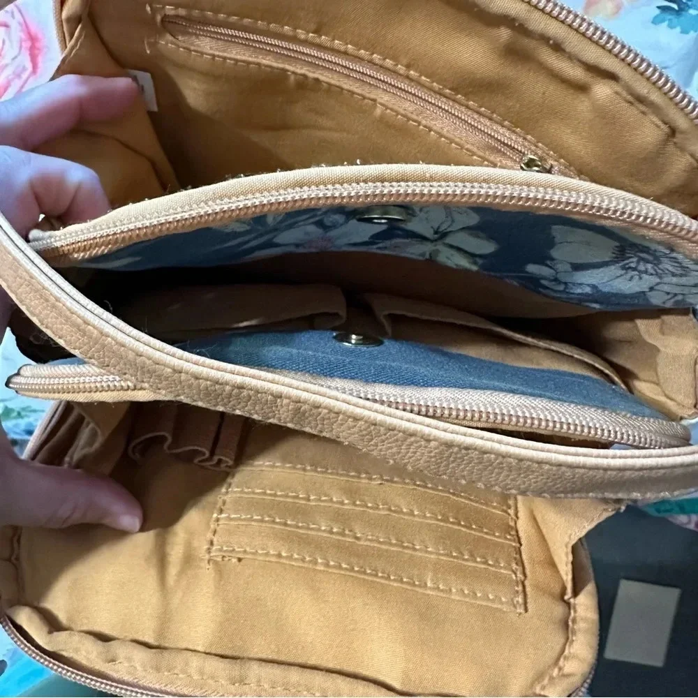 Jaclyn Smith women's floral crossbody with lots of pockets